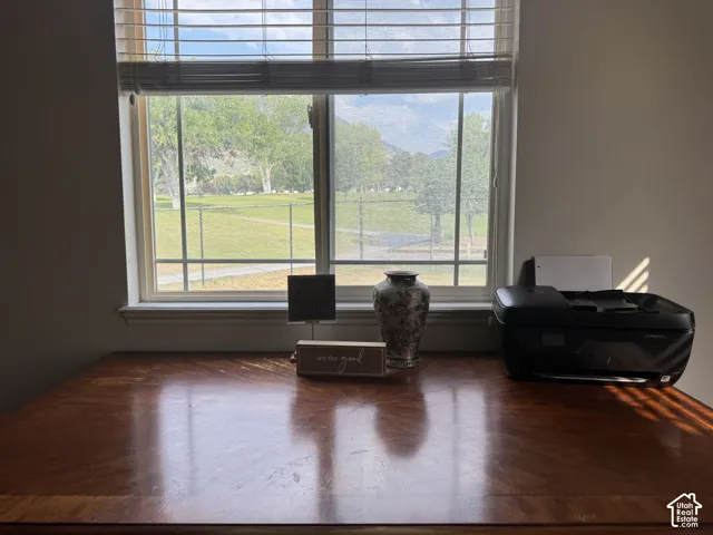 Oquirrh Golf Course view from primary bedroom.  Using this space for an office provides a gorgeous view that offers an escape from work.  It is relaxing and calming at the end of your day.