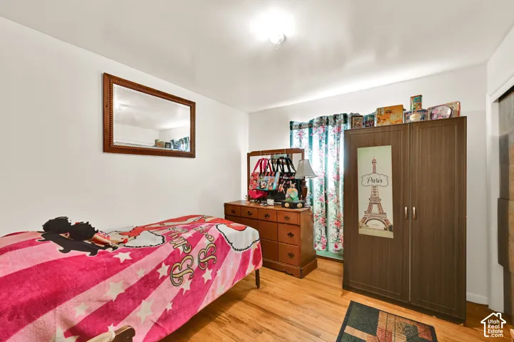 1st Bedroom with hardwood floors