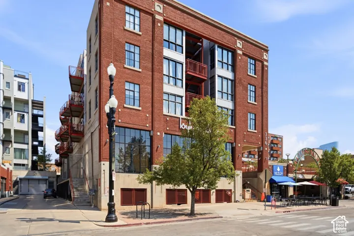 Brick exterior with large windows