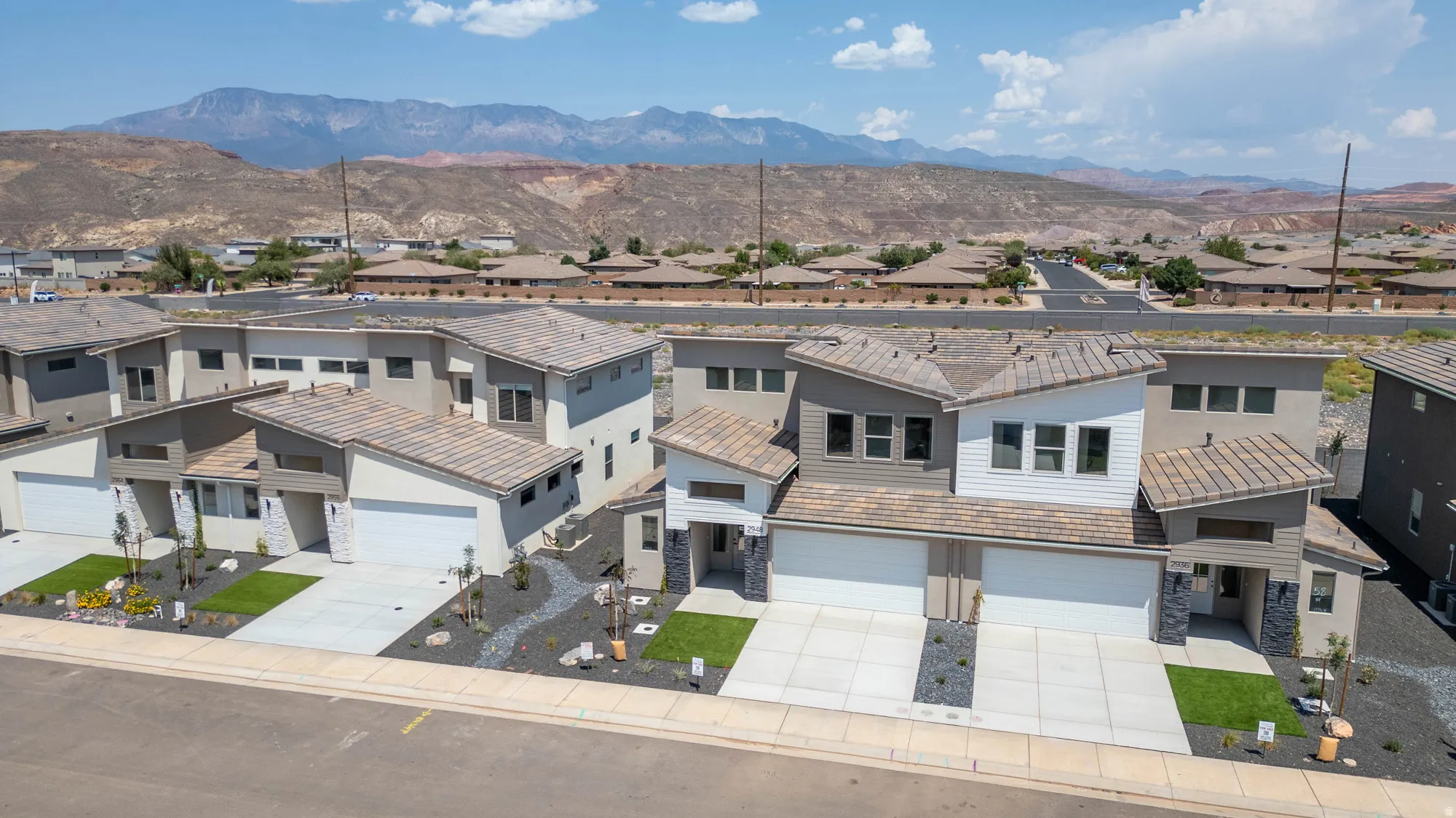 Modern multi-level residences featuring stucco and siding exteriors