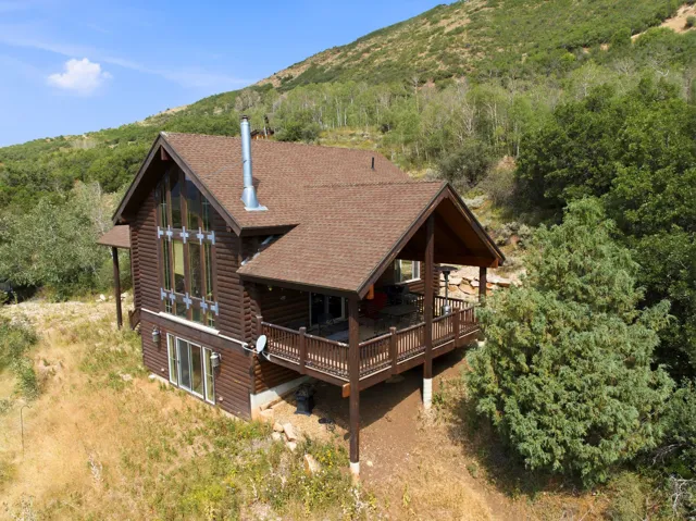 Wood-sided exterior with a prominent A-frame window design