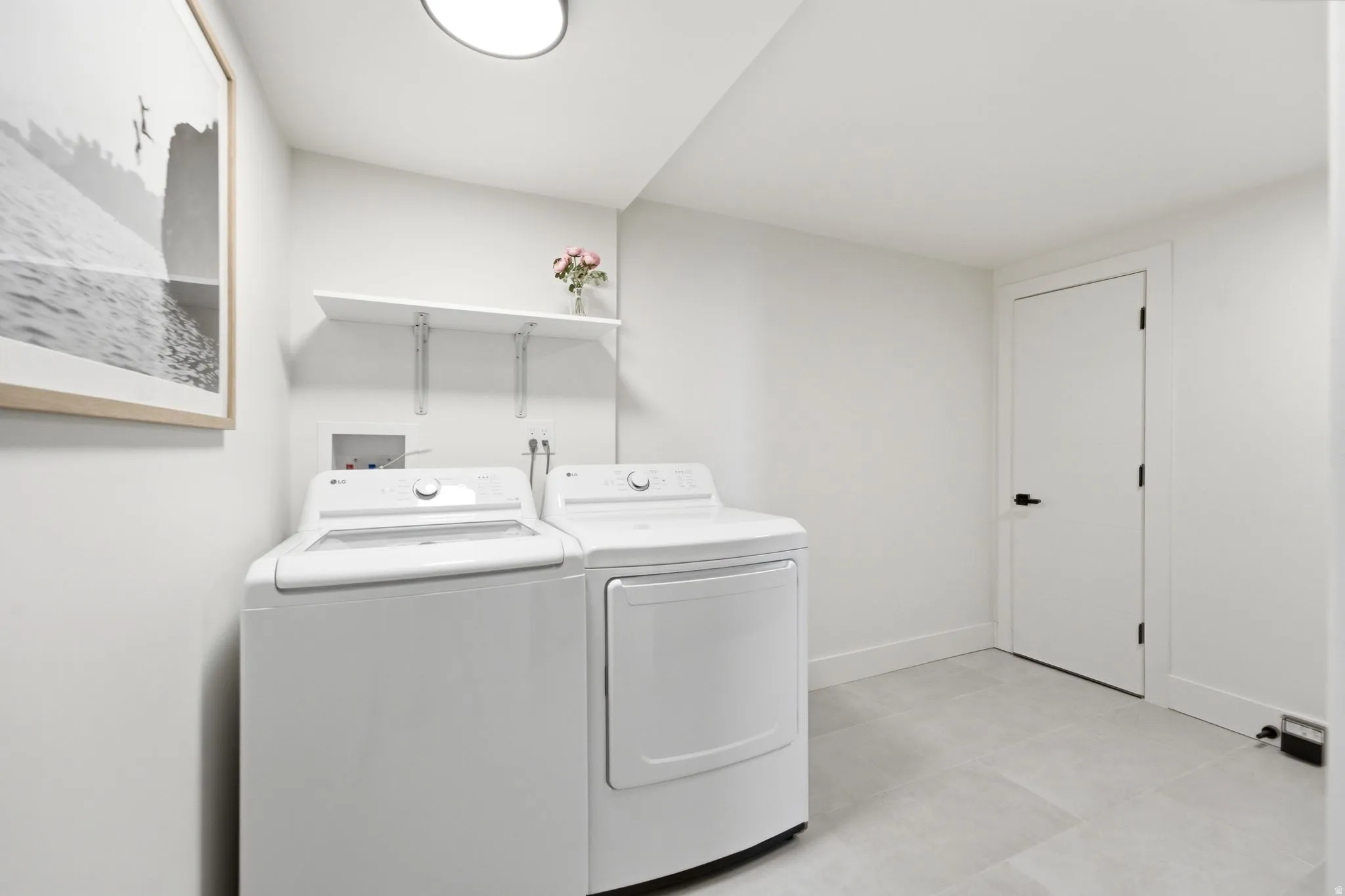 Hard-surface flooring, white walls, and a built-in shelf