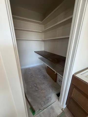Built-in shelving with a wood-finish counter