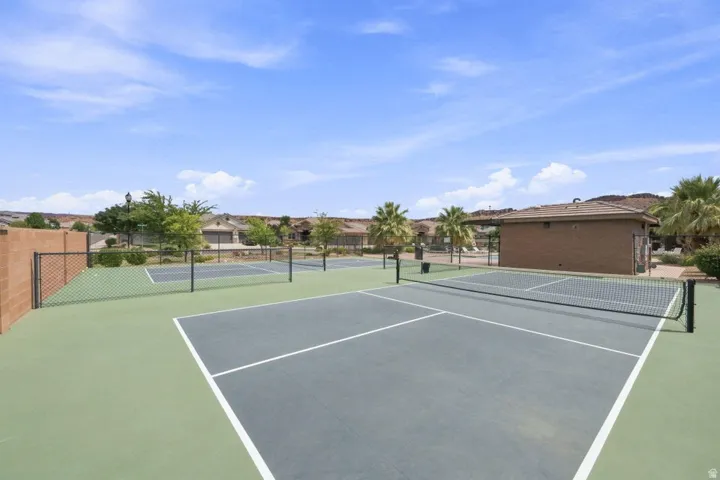 Multiple outdoor courts with durable surfacing and perimeter fencing