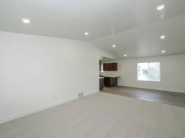 Vaulted ceiling with recessed lighting