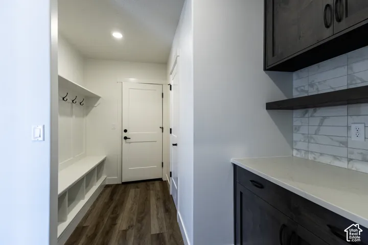 Mudroom with built-in bench seating and storage cubbies