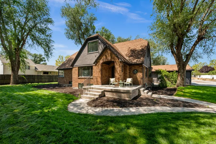 Brick exterior with a gabled roof and front porch