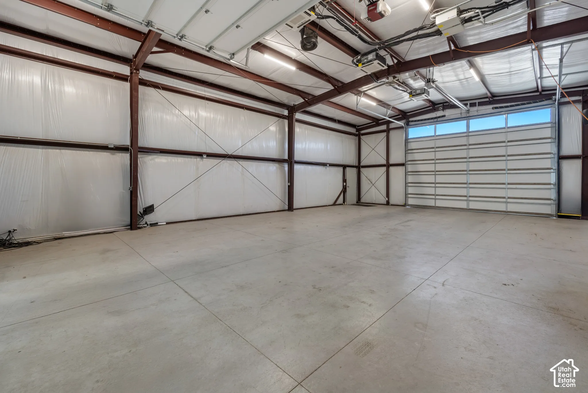 Spacious open interior with exposed steel beam construction
