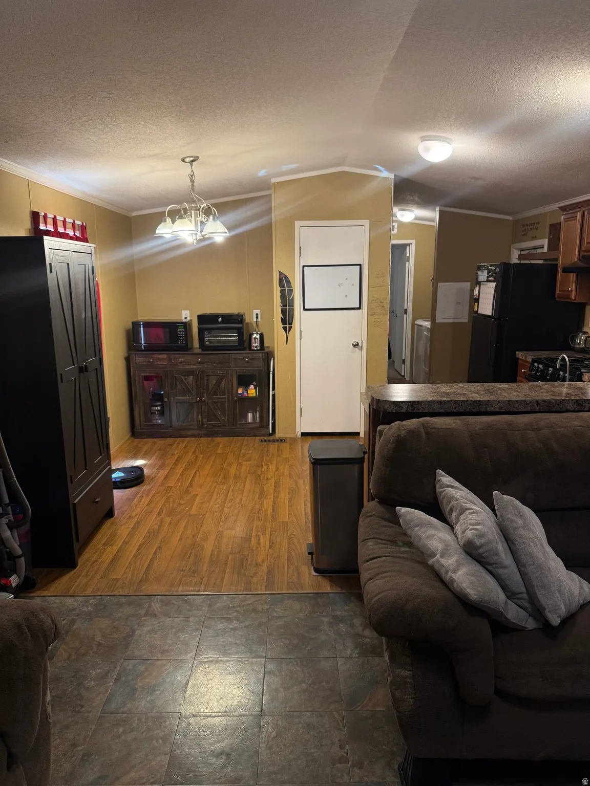 Wood-finish flooring with a transitional tile entry