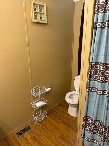 Wood-finish flooring with a floor vent