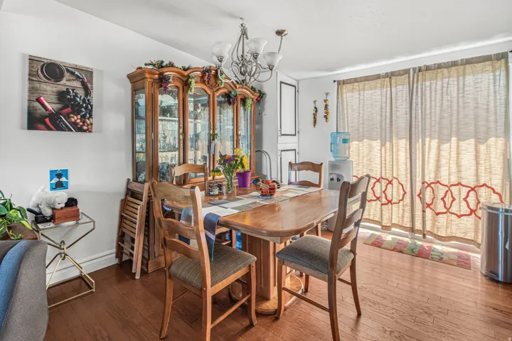 Wood-finish flooring with a decorative area rug