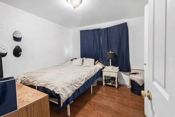 Wood-finish flooring with white walls