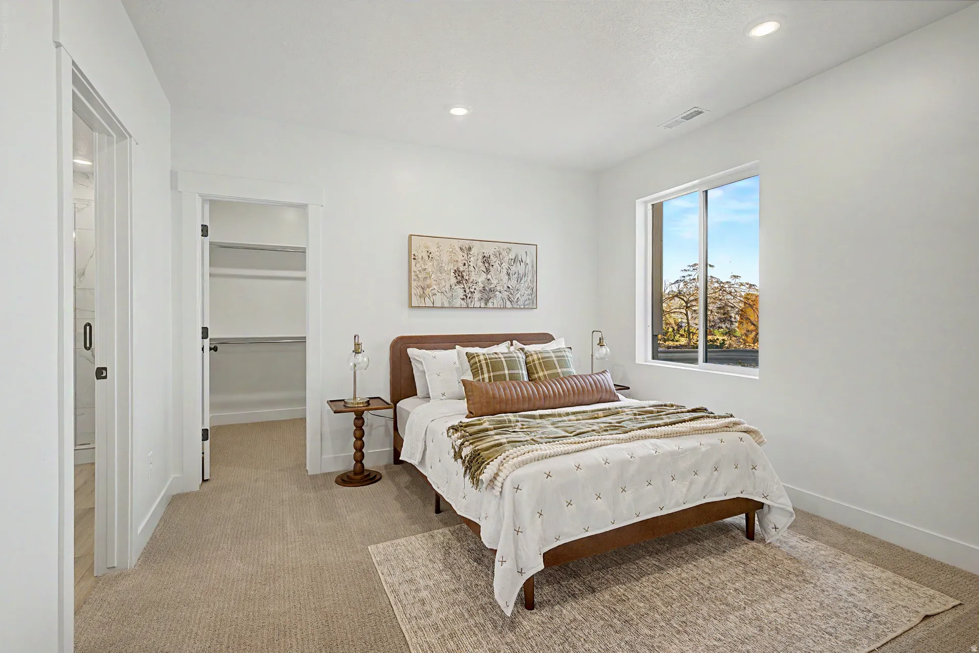 Basement bedroom with ensuite.Images are from GTM's 2026 SL Parade Home.