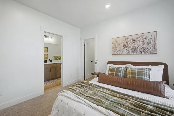 Basement bedroom with ensuite.Images are from GTM's 2026 SL Parade Home.