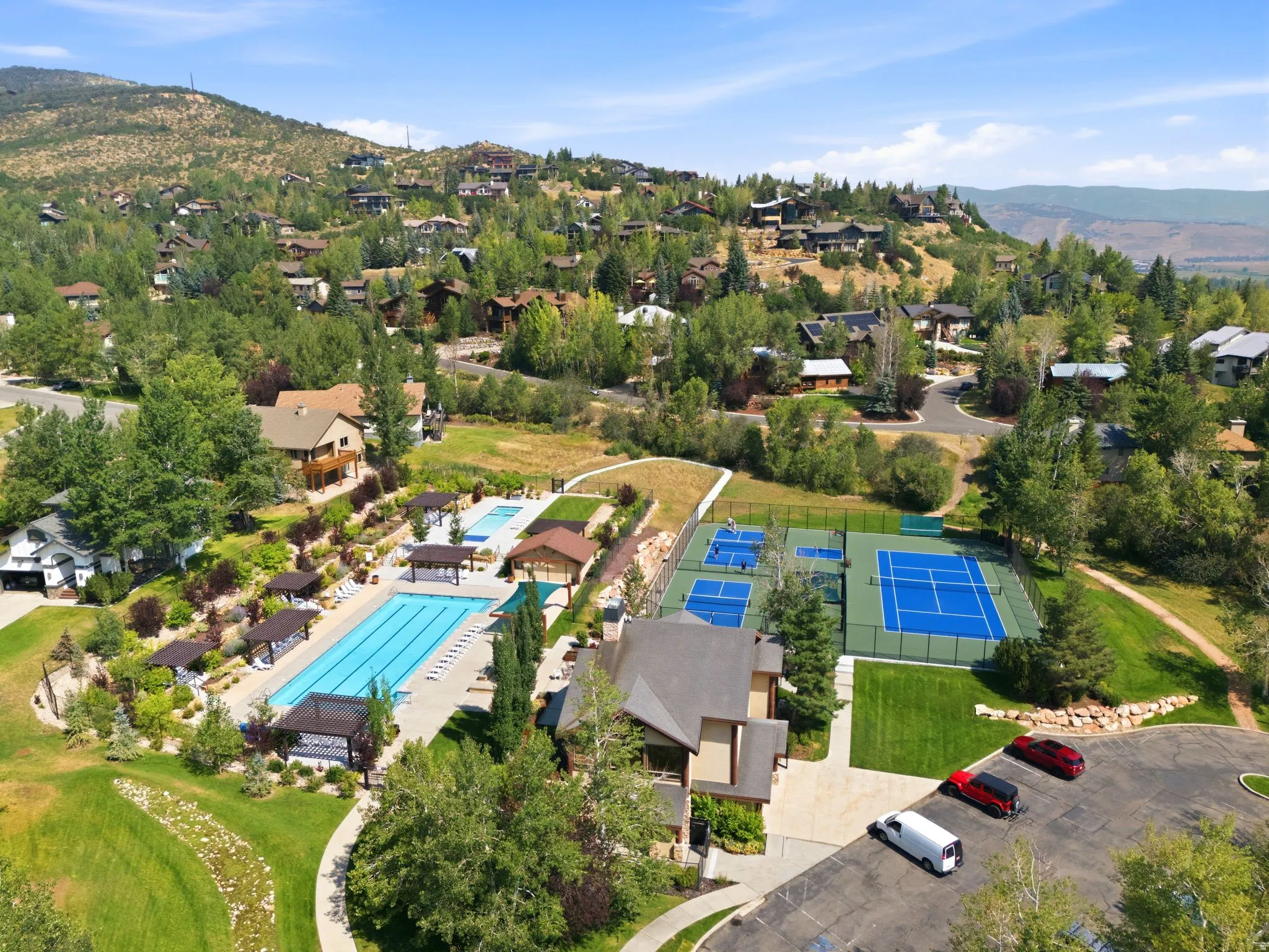Views of the Canyons, Deer Valley and Park City Ski Resorts. Sun Peak Clubhouse allows access to 312 acres of community open space, hiking trails, mountain biking trails, walking trails, tennis courts, pickleball courts, a pool and more! Perfectly situate