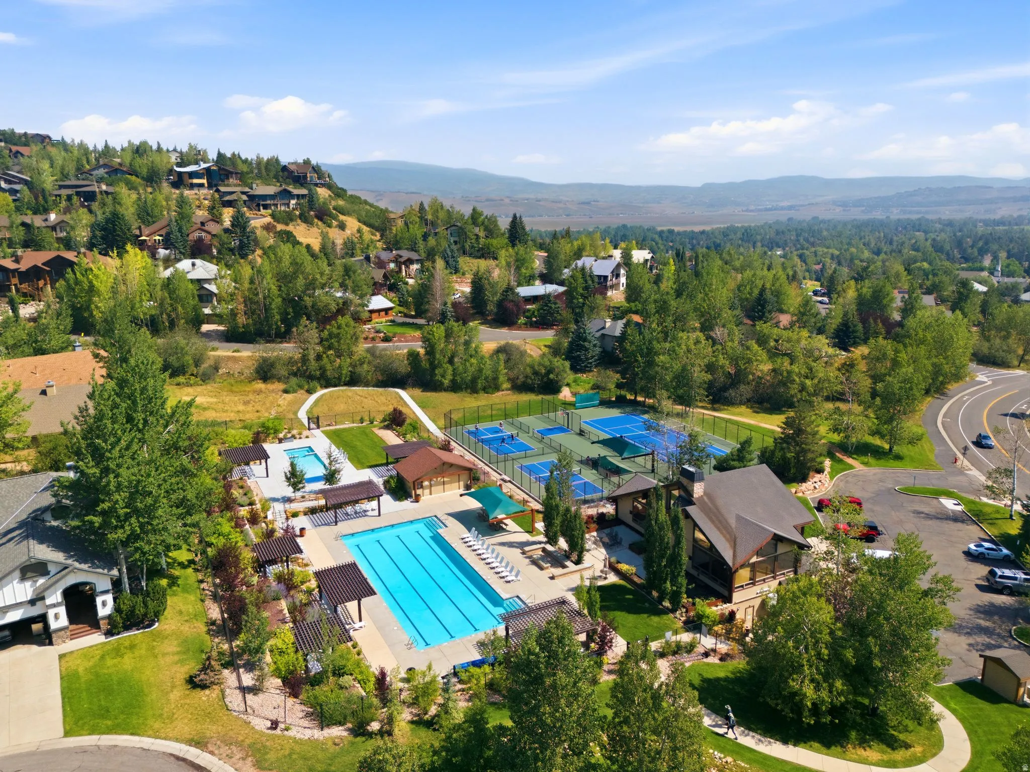 Views of the Canyons, Deer Valley and Park City Ski Resorts. Sun Peak Clubhouse allows access to 312 acres of community open space, hiking trails, mountain biking trails, walking trails, tennis courts, pickleball courts, a pool and more! Perfectly situate