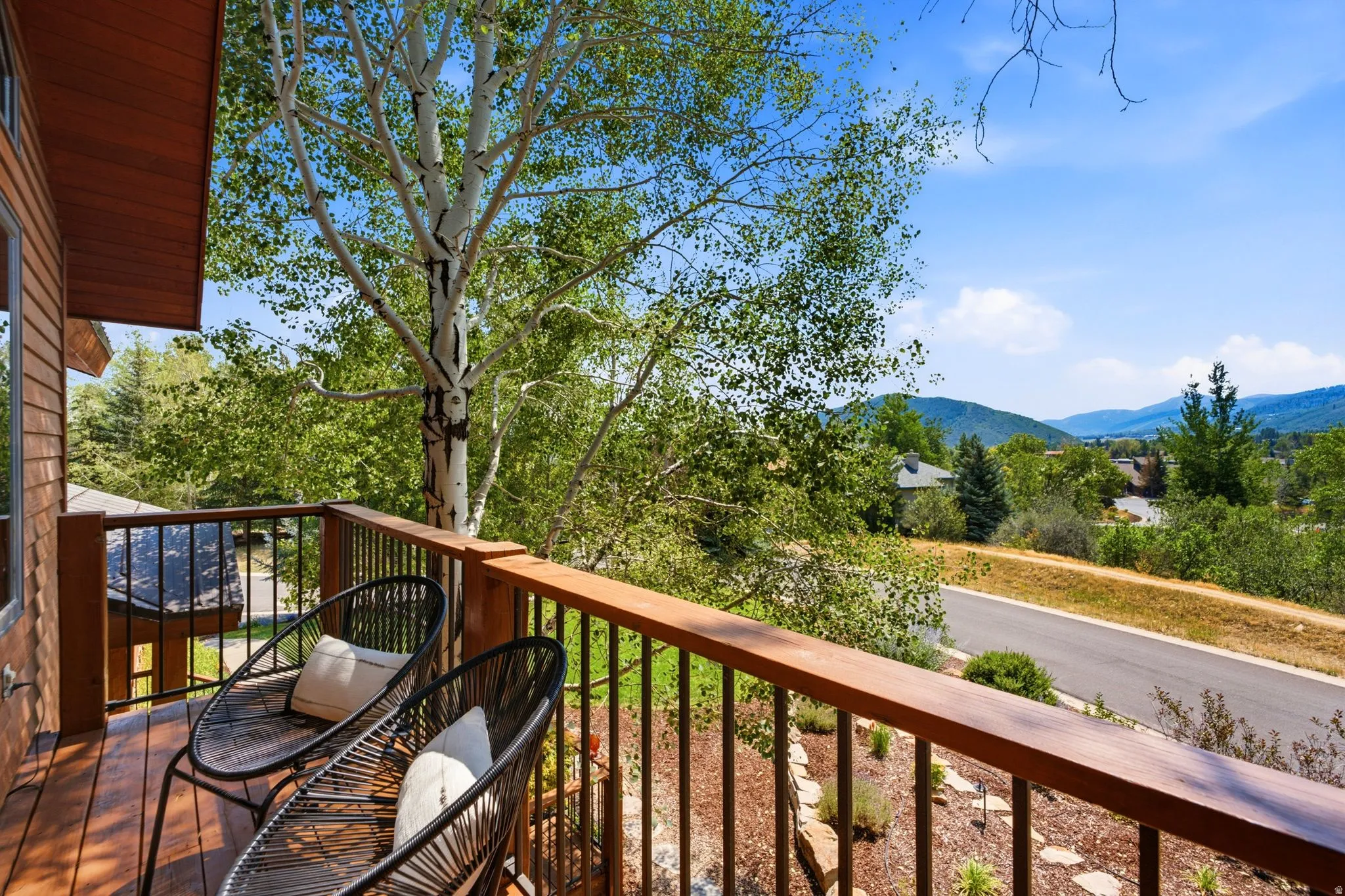 Private balcony with views of the mountains and ski resorts right in the comfort of your primary suite!