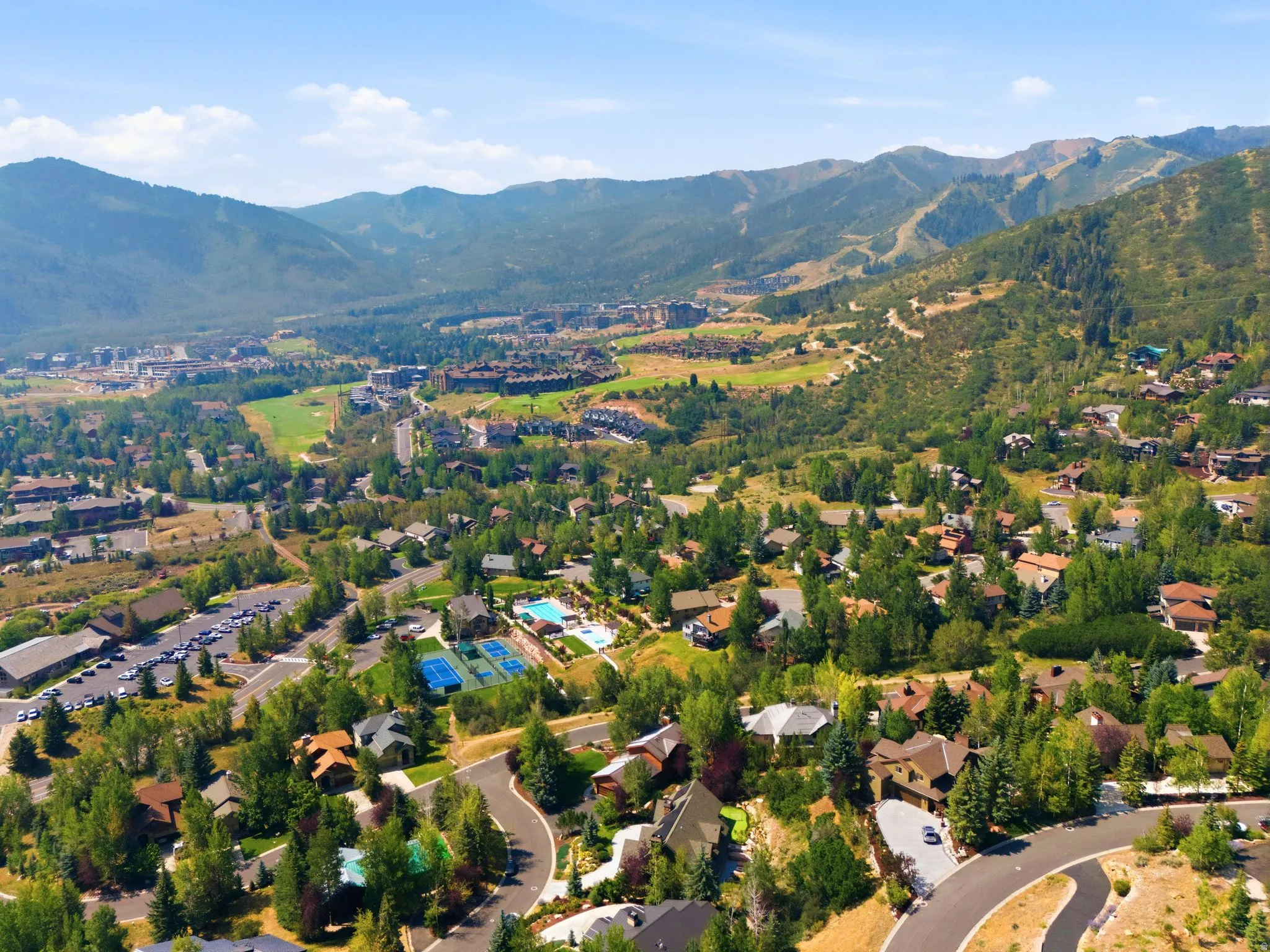 Views of the Canyons, Deer Valley and Park City Ski Resorts. Sun Peak Clubhouse allows access to 312 acres of community open space, hiking trails, mountain biking trails, walking trails, tennis courts, pickleball courts, a pool and more! Perfectly situate