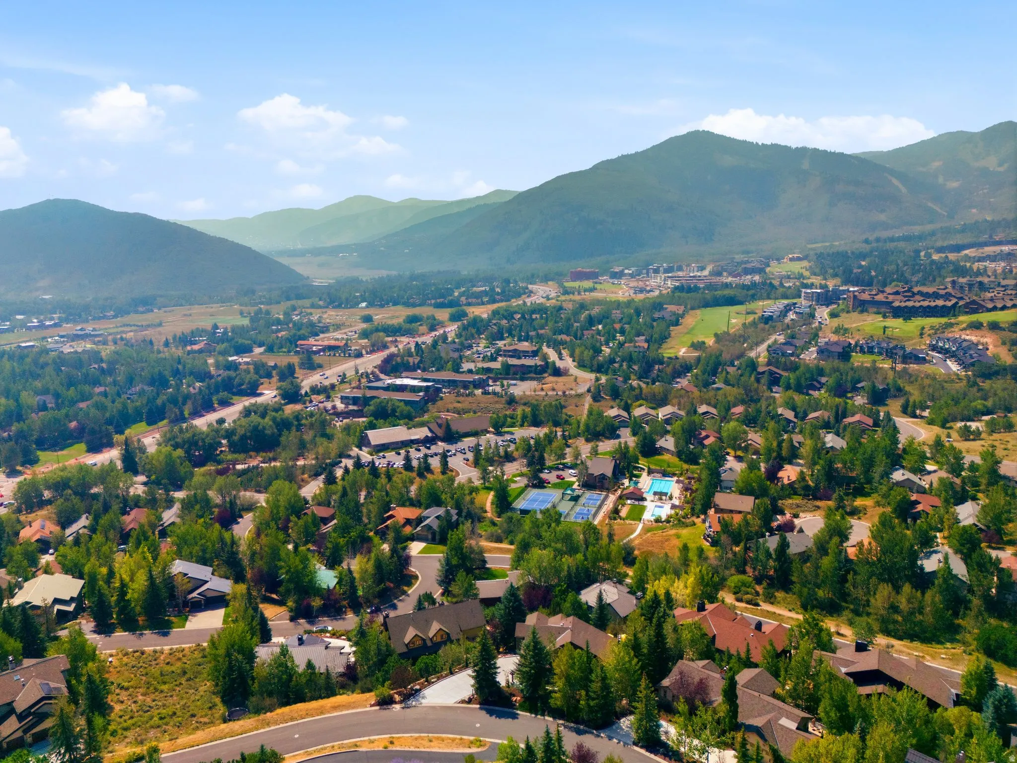 Views of the Canyons, Deer Valley and Park City Ski Resorts. Sun Peak Clubhouse allows access to 312 acres of community open space, hiking trails, mountain biking trails, walking trails, tennis courts, pickleball courts, a pool and more! Perfectly situate