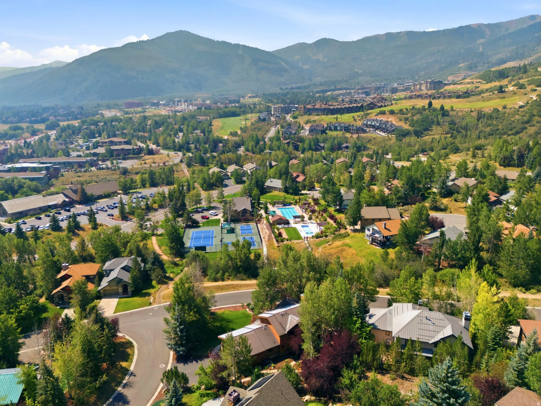 Views of the Canyons, Deer Valley and Park City Ski Resorts. Sun Peak Clubhouse allows access to 312 acres of community open space, hiking trails, mountain biking trails, walking trails, tennis courts, pickleball courts, a pool and more! Perfectly situate
