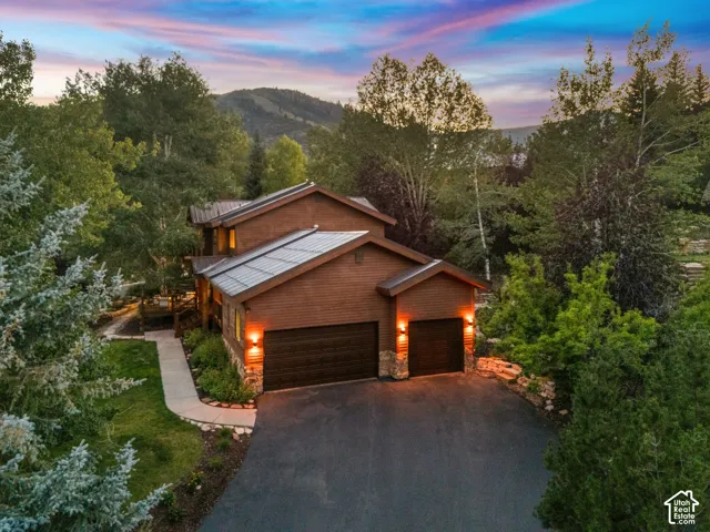 Well maintained wood siding and a 70 year metal roof.  3 car garage with ample storage and additional off-street driveway parking.