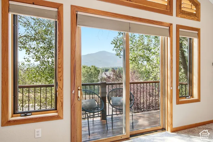 Private balcony with views of the mountains and ski resorts right in the comfort of your primary suite!