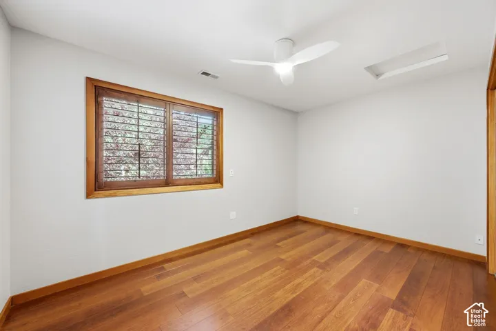 3rd upper level bedroom with hardwood floors and ample closet space.