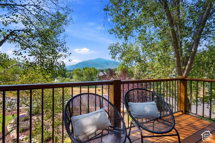 Private balcony with views of the mountains and ski resorts right in the comfort of your primary suite!
