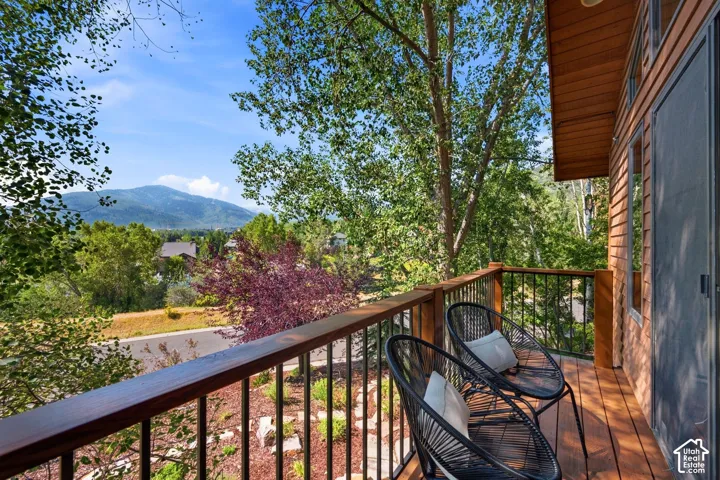 Private balcony with views of the mountains and ski resorts right in the comfort of your primary suite!