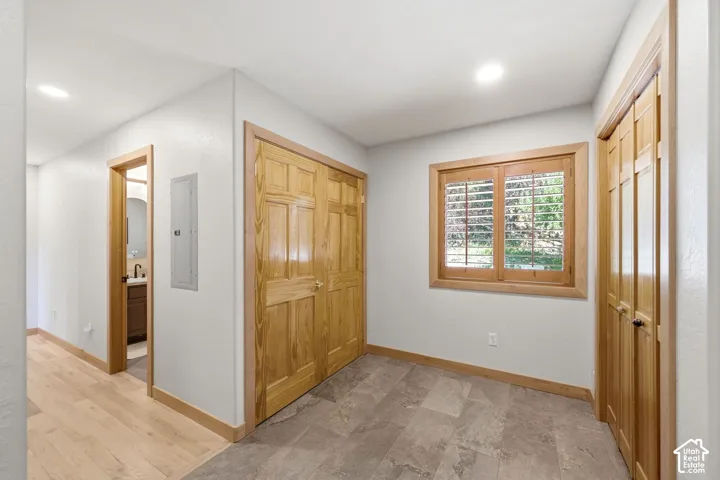 Mudroom with ample storage and heated floors right off of the garage entrance into the home.