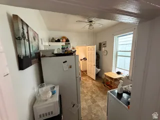 Unit 2 kitchen featuring vinyl floors.
