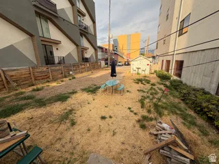 Spacious backyard with shed and parking space.