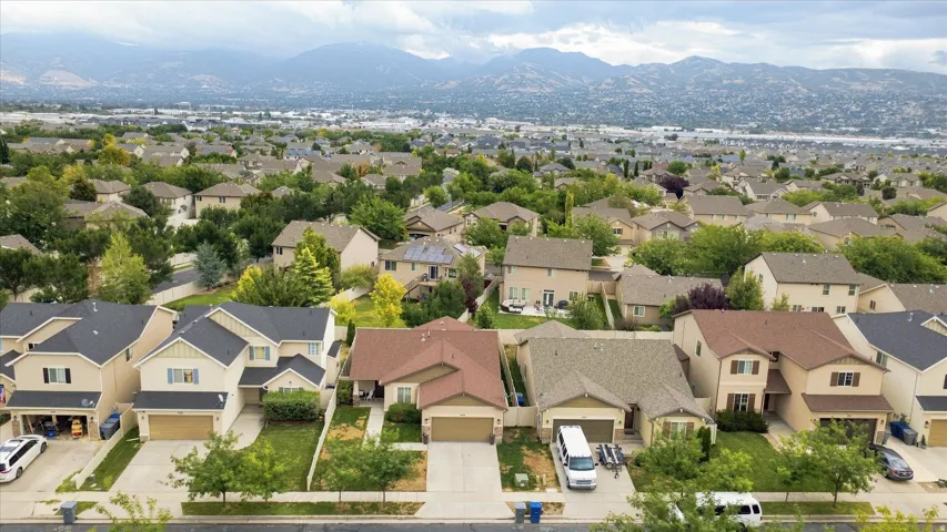 Prestigious suburban community featuring established two-story residences with varied architectural styles, mature landscaping, and manicured lawns
