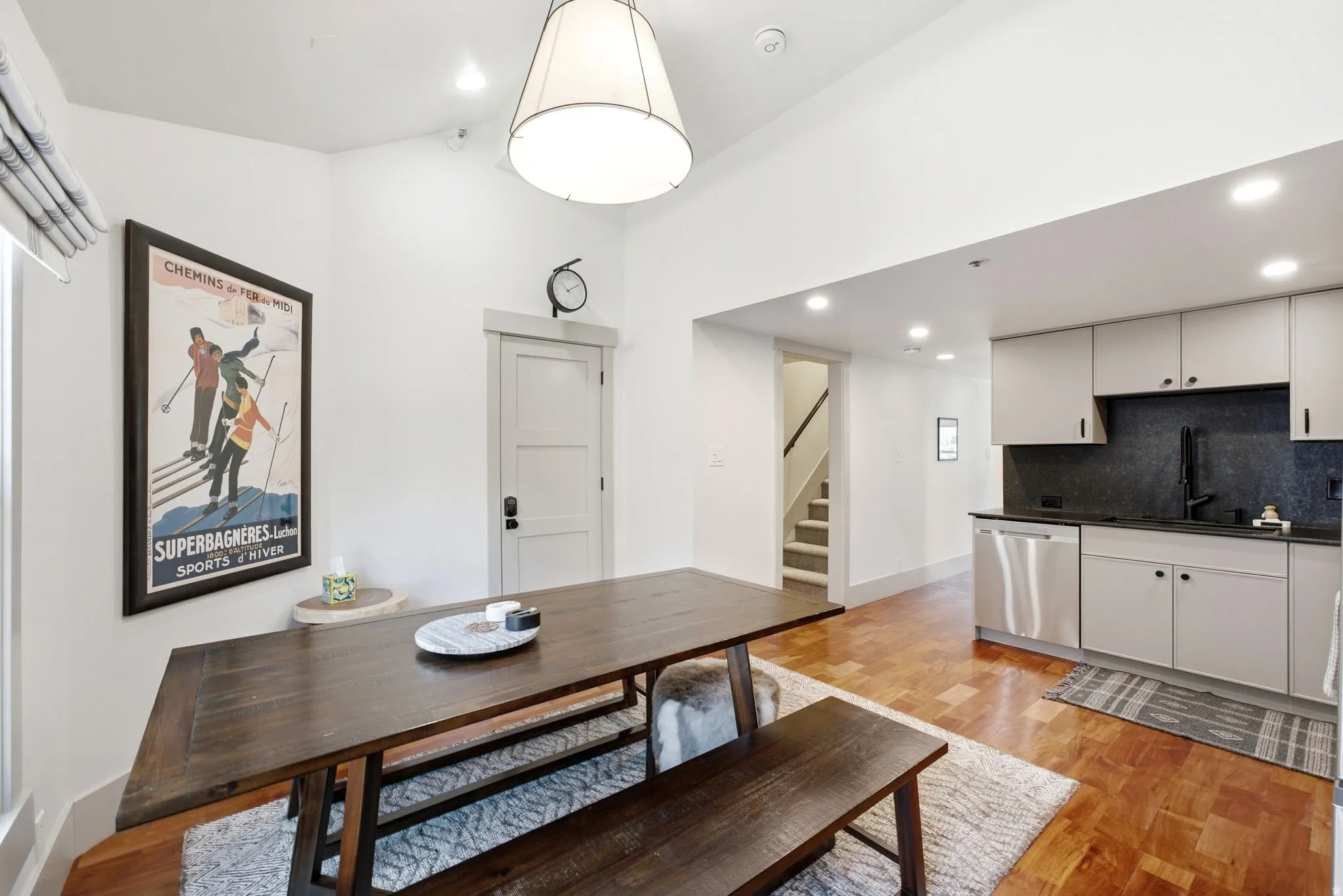 Hardwood flooring, recessed lighting, vaulted ceiling, built-in cabinetry, stainless steel dishwasher