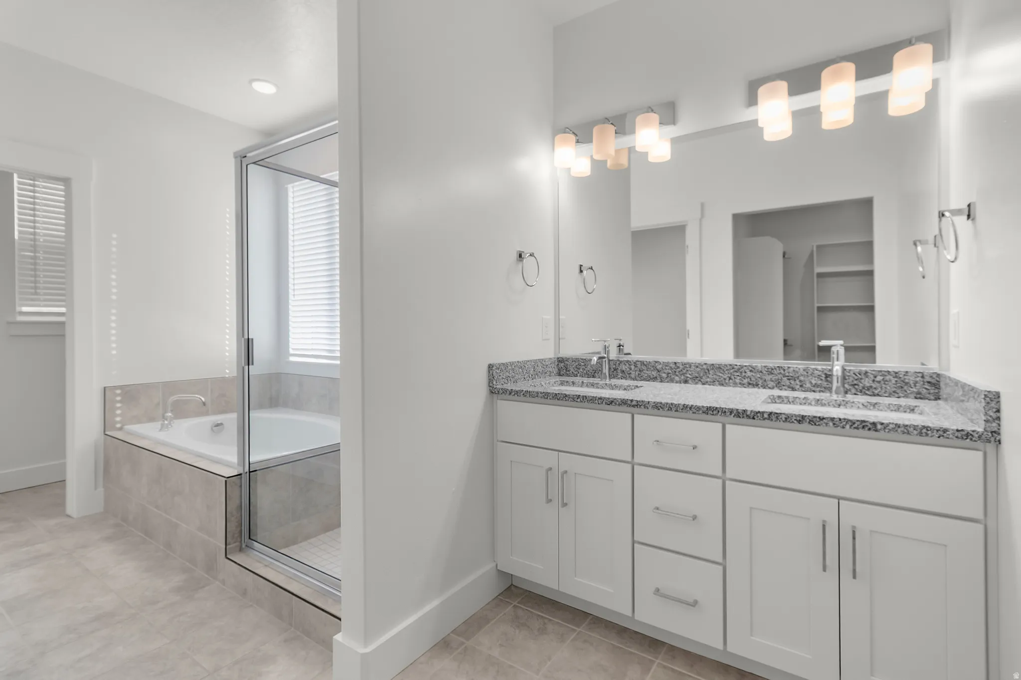 Primary Bathroom-*Photos are of a similar home. Actual home will have slightly different selections and finishes