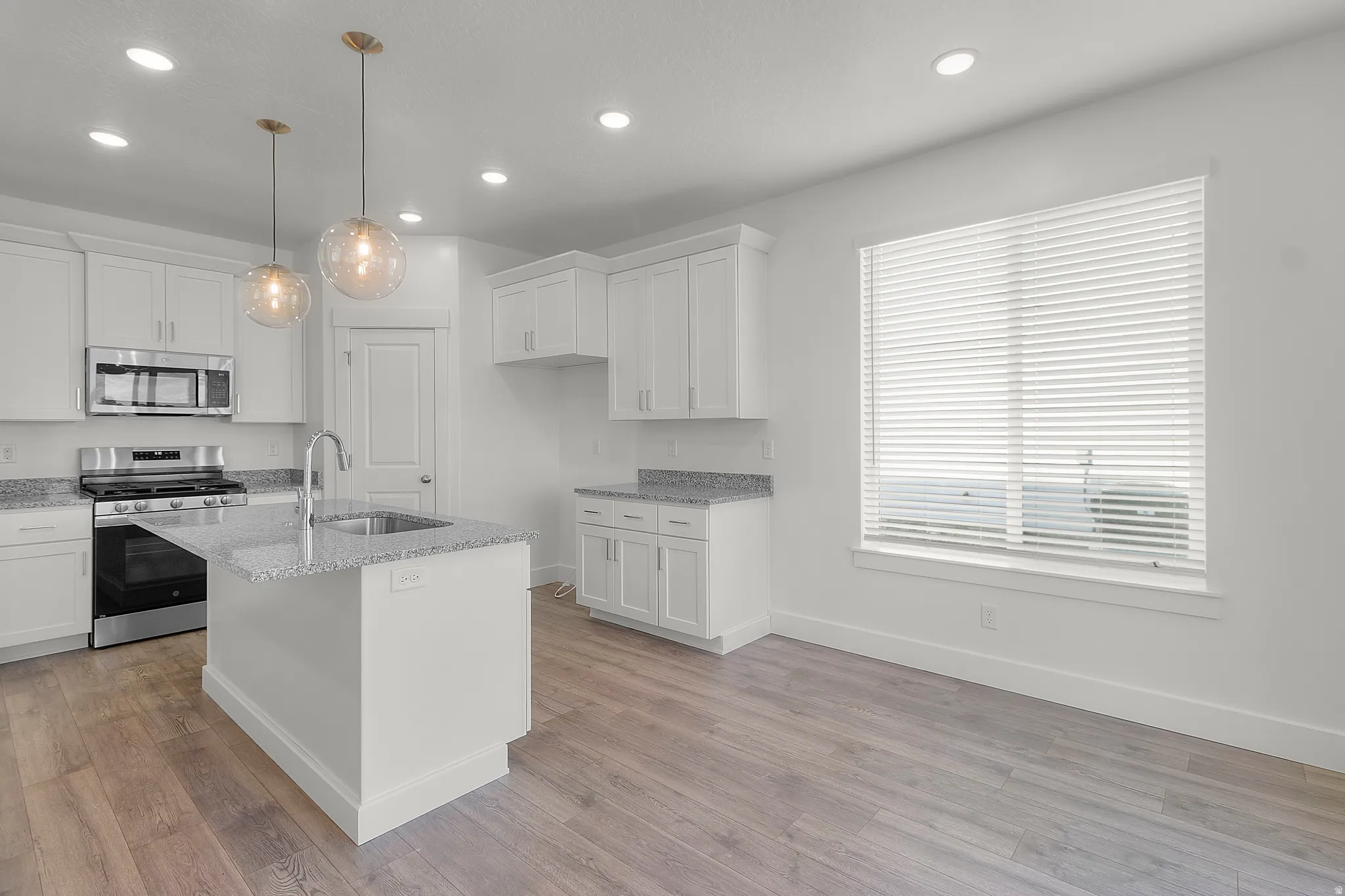 Kitchen *Photos are of a similar home. Actual home will have slightly different selections and finishes
