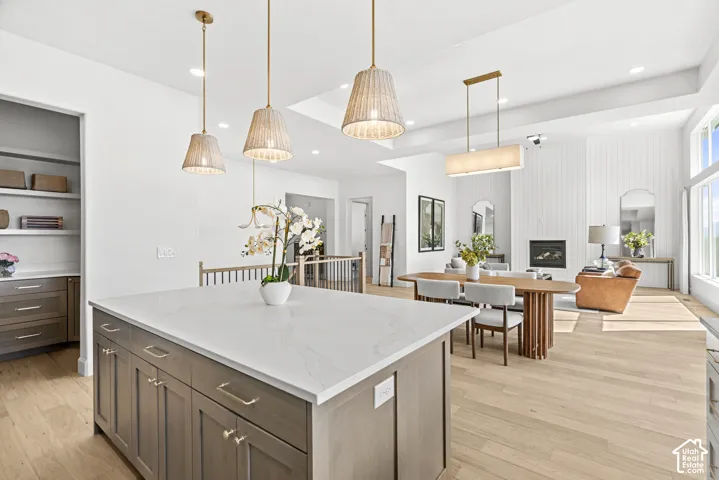 White quartz countertop island with integrated cabinetry