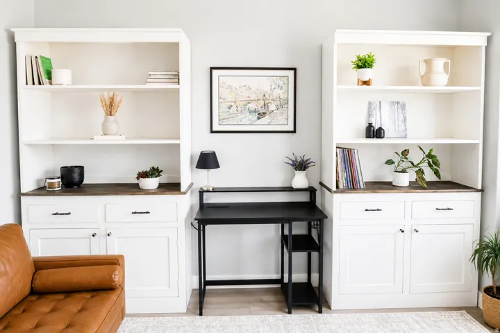Custom built-in cabinetry with open shelving and lower storage