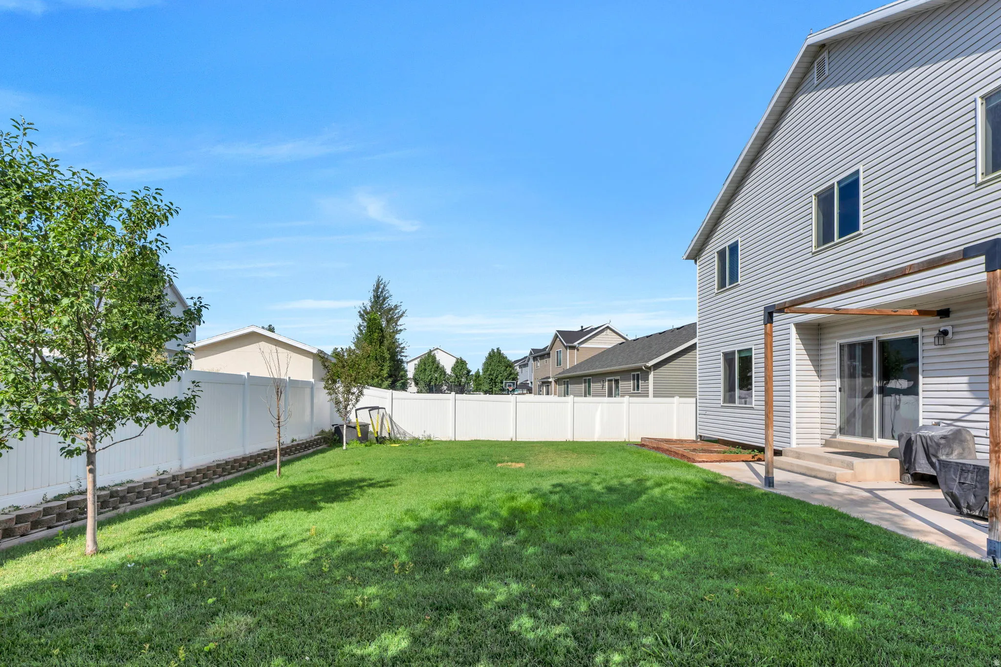 Fully fenced yard with two gates