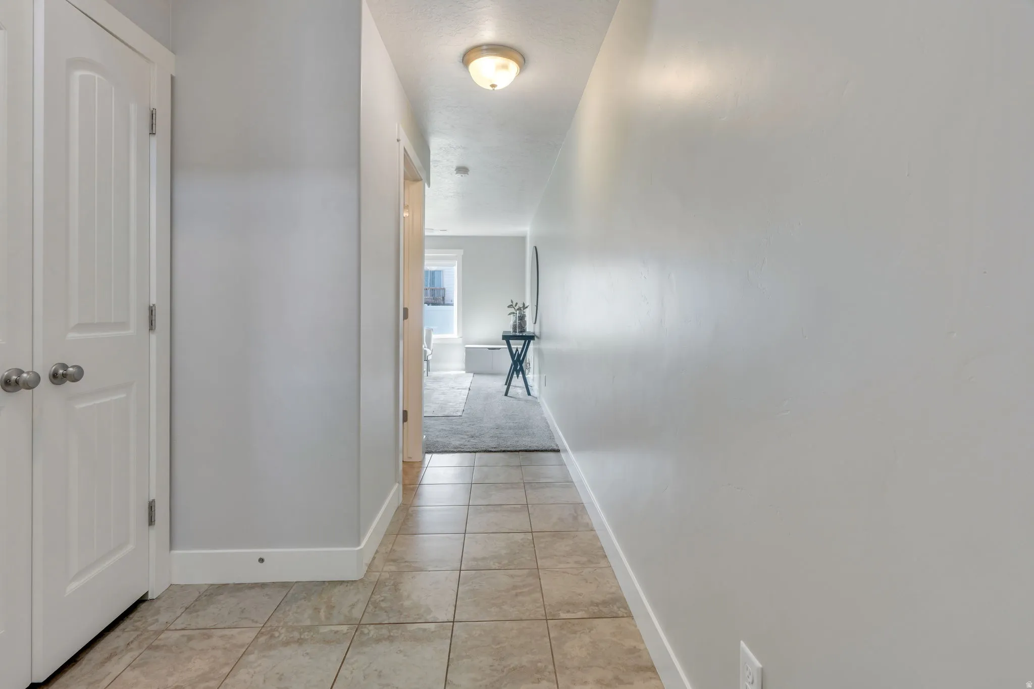 Tile entryway leads to main living area