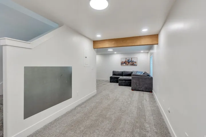 Wood finished ceiling beam