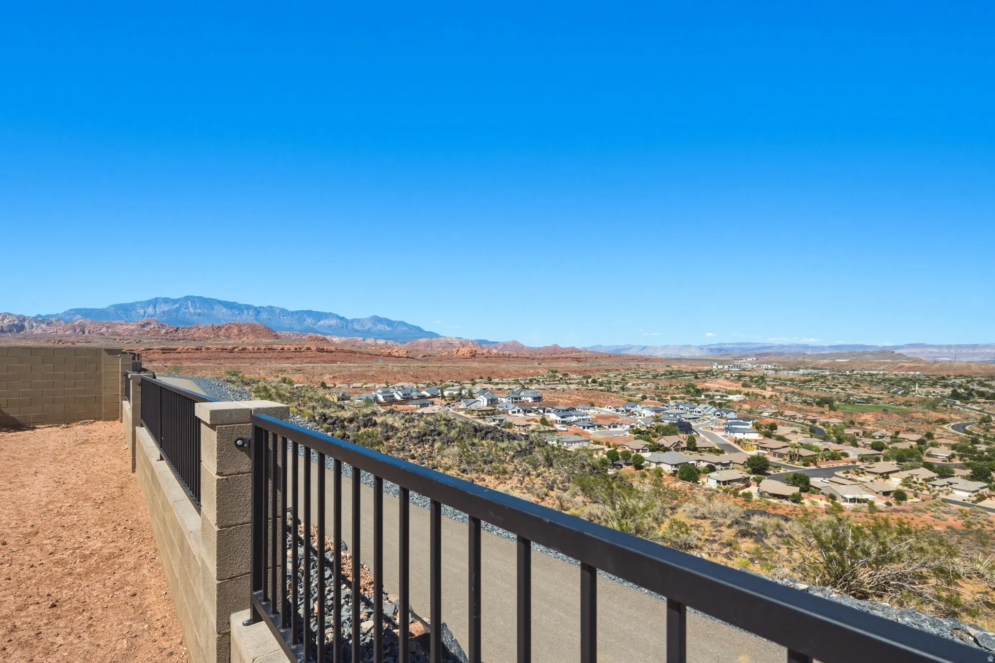 Views of Pine View Mountains, Red Rocks and Coral Canyon community below