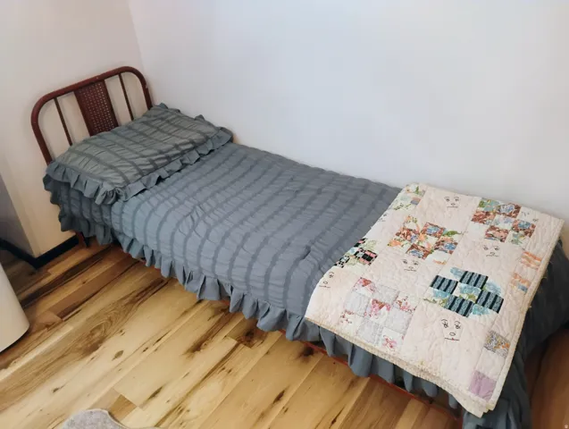 Wood-finish flooring with bright white walls