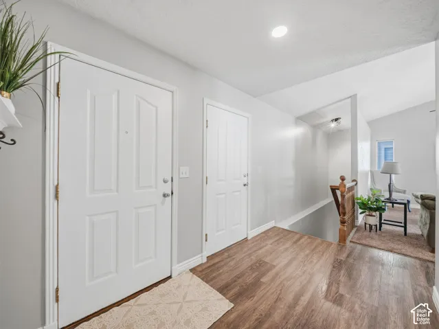 Wood-finish flooring throughout the entry