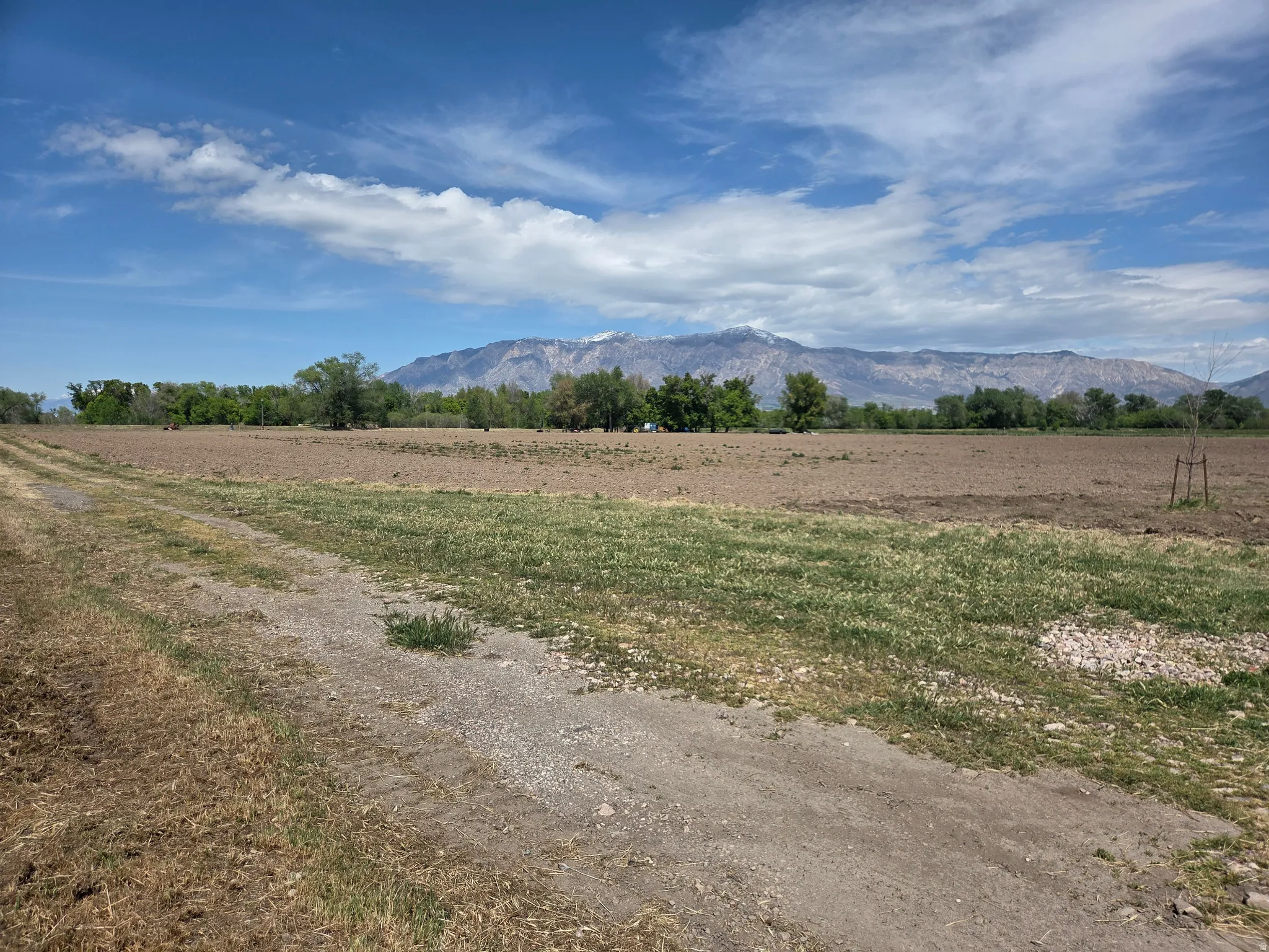 Expansive undeveloped land with distant mountain backdrop