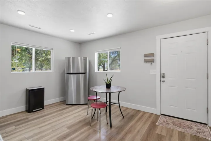 Stainless steel refrigerator included.