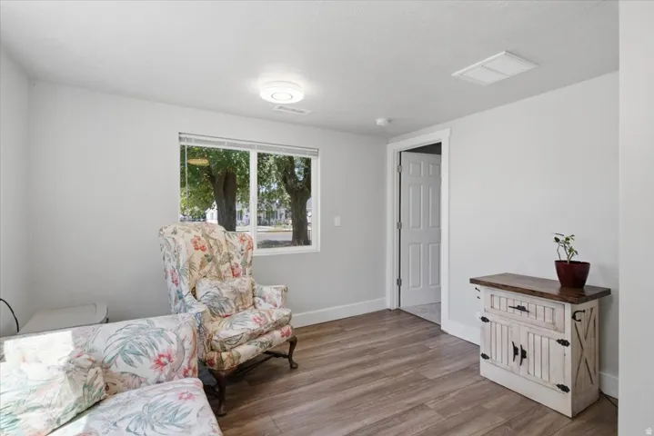 Bright living room with views looking out to North Fort Disc Golf Course/Observatory Park