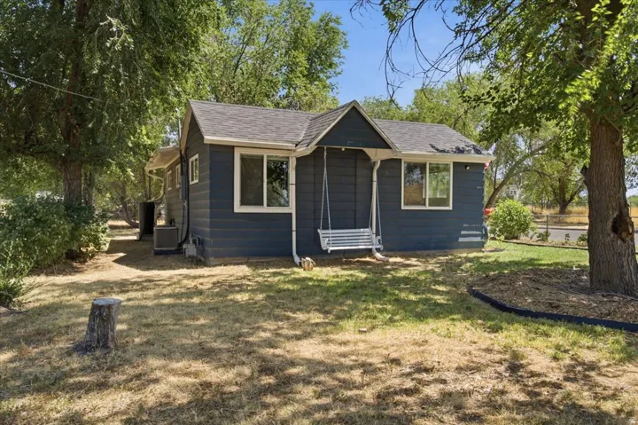 Swing included, perfect place to sit and enjoy the big, gorgeous yard