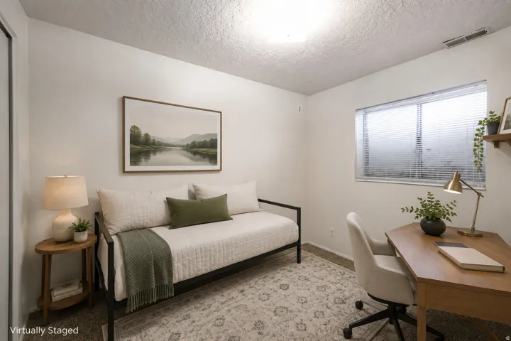 White painted walls with a textured ceiling
