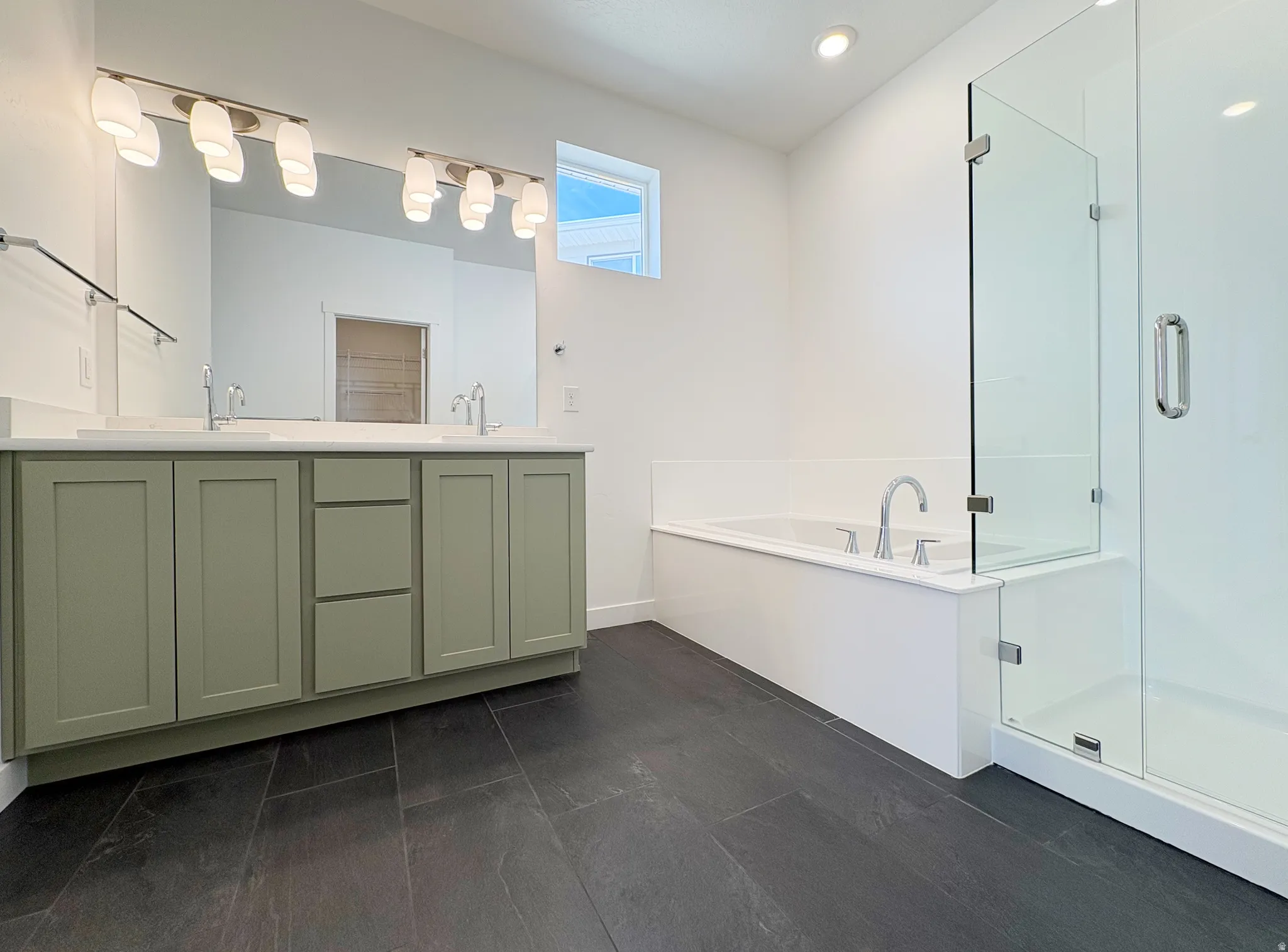 Start your day refreshed in this bright and functional space.